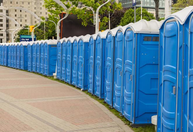 a row of portable restrooms at a trade show, catering to visitors with a professional and comfortable experience in Lake Villa